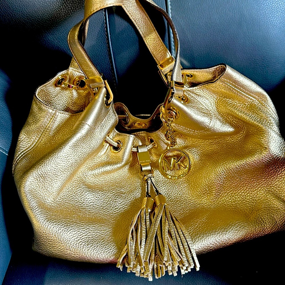 Gold leather, Michael Kors handbag.